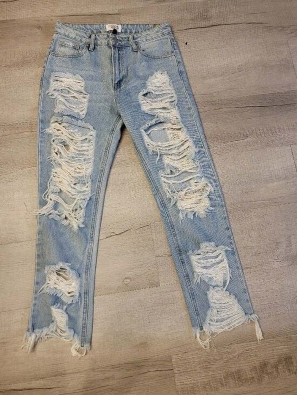 Women’s Light Blue Ripped Skinny Jeans by